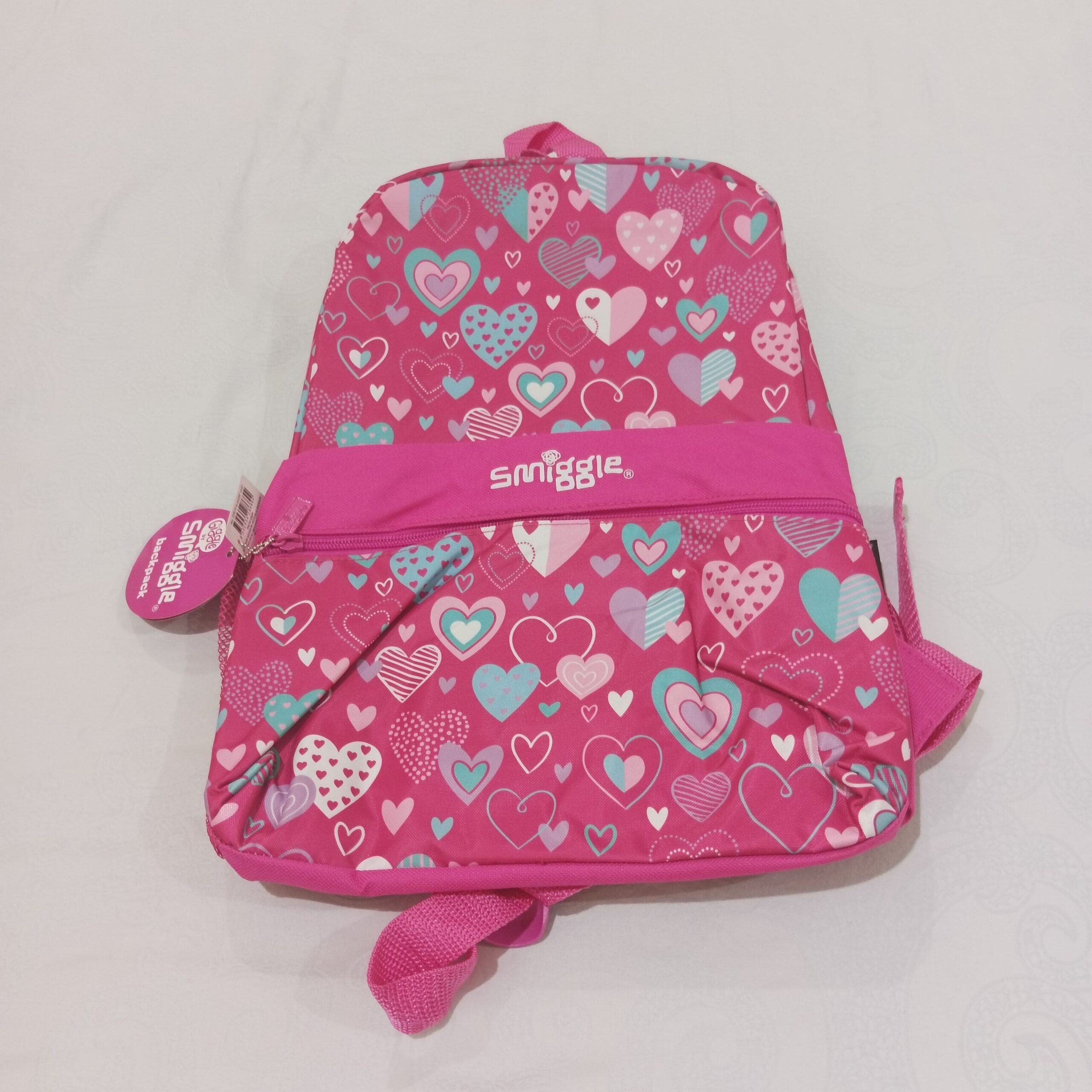 Tas Ransel Anak Sekolah (PAUD/Kindergaten) "Smiggle Giggle Heart Print Pink" warna Pink Motif Pink Heart